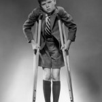 boy with crutches B&W